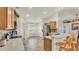 Bright kitchen features stainless steel appliances, breakfast nook, and breakfast bar at 3787 Sandhill Crane Dr, Lakeland, FL 33811