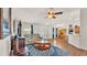 Open living room with hardwood floors, bright natural light and furniture at 3787 Sandhill Crane Dr, Lakeland, FL 33811