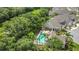 Community aerial view with pool, green space, and well-maintained landscaping and multiple townhome units at 4309 Shipp Ct, Lakeland, FL 33813