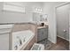Bright bathroom featuring a soaking tub, granite vanity, and a stylish leopard print rug on hardwood floors at 4340 Reding Way, Lakeland, FL 33813