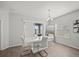 Dining area features a large mirror, modern table and a slider to the lanai at 4340 Reding Way, Lakeland, FL 33813