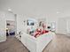Modern living room features a white sectional, accent chair, and stylish decor at 4340 Reding Way, Lakeland, FL 33813