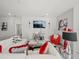 Cozy living room with white couches and accent furniture, ideal for relaxing and entertaining at 4340 Reding Way, Lakeland, FL 33813