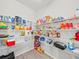 Spacious walk-in pantry with ample shelving for organized storage at 4340 Reding Way, Lakeland, FL 33813