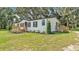 Well-maintained single-Gathering home with inviting front porch and manicured landscaping at 4931 Dove Cross Dr, Lakeland, FL 33810