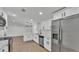 Contemporary kitchen featuring stainless steel appliances and light countertops and cabinetry at 4931 Dove Cross Dr, Lakeland, FL 33810