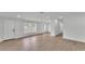 Large, sunny living room with sleek flooring and neutral color palette at 4931 Dove Cross Dr, Lakeland, FL 33810