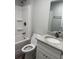 Bathroom with a shower and tub combination, and a granite countertop vanity at 526 & 528 2Nd Sw St, Fort Meade, FL 33841