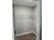 Walk-in closet with vinyl floors and built-in shelving at 526 & 528 2Nd Sw St, Fort Meade, FL 33841