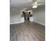 An open floorplan with the living room, kitchen, and dining room featuring modern design at 526 & 528 2Nd Sw St, Fort Meade, FL 33841
