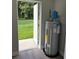Utility room featuring an open back door and a new water heater at 526 & 528 2Nd Sw St, Fort Meade, FL 33841