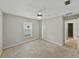 Bedroom featuring neutral walls, ceiling fan, and natural light at 5522 1St Se St, Lakeland, FL 33812
