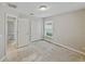 Comfortable bedroom featuring a double door closet and a window for ample natural light at 5522 1St Se St, Lakeland, FL 33812