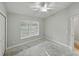 Bedroom featuring a ceiling fan and a window with natural light at 5522 1St Se St, Lakeland, FL 33812