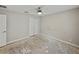 Bedroom featuring neutral walls, ceiling fan, and a closet at 5522 1St Se St, Lakeland, FL 33812