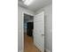 Hallway leading into the home's bright, spacious kitchen at 5522 1St Se St, Lakeland, FL 33812