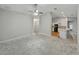 Open living room area with a view into the kitchen, ready for personalization at 5522 1St Se St, Lakeland, FL 33812