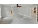 Spacious main bedroom with multiple entry points, providing a seamless flow throughout the home at 5522 1St Se St, Lakeland, FL 33812