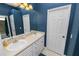 Bright bathroom features double sinks, a large mirror, plenty of cabinet space, and modern fixtures at 6217 Ashley Dr, Lakeland, FL 33813