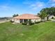 A spacious backyard with an outdoor patio offers plenty of room for entertaining at 6217 Ashley Dr, Lakeland, FL 33813