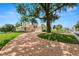 Lovely single-Gathering home with brick driveway, mature trees, and well-maintained landscaping at 6217 Ashley Dr, Lakeland, FL 33813