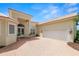 Charming single-story home with a brick driveway, two-car garage, and manicured landscaping at 6217 Ashley Dr, Lakeland, FL 33813