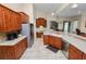Well-equipped kitchen featuring ample cabinets, stainless steel appliances, and tile floors at 6217 Ashley Dr, Lakeland, FL 33813