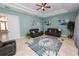 Comfortable sun room featuring tile flooring, recessed lighting, and neutral decor at 6217 Ashley Dr, Lakeland, FL 33813