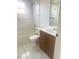 Clean bathroom featuring a shower-tub combo and vanity at 624 Brockton Dr, Kissimmee, FL 34758