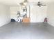 Spacious garage with water heater, door and open floor space at 624 Brockton Dr, Kissimmee, FL 34758