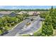 Aerial view of gated community entrance with lush landscaping and well-maintained street at 6365 Torrington Cir, Lakeland, FL 33811