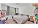 Bright bedroom with a large window, a dresser and a desk space at 6365 Torrington Cir, Lakeland, FL 33811