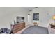 Comfortable bedroom with a dresser for storage and ample space at 6365 Torrington Cir, Lakeland, FL 33811