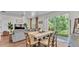 Open-concept dining area with a large sliding glass door, seamlessly connecting indoor and outdoor spaces at 6365 Torrington Cir, Lakeland, FL 33811