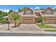Attractive townhome showcasing a well-maintained brick driveway and colorful tropical landscaping at 6365 Torrington Cir, Lakeland, FL 33811