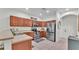 Updated kitchen featuring stainless steel appliances, tile flooring, and ample cabinet space at 6365 Torrington Cir, Lakeland, FL 33811