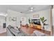 Spacious living room features hard wood floors and neutral paint throughout the house at 6365 Torrington Cir, Lakeland, FL 33811