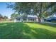 Charming single-story home with a well-maintained lawn and mature shade trees at 6507 Shadowbrook Run, Lakeland, FL 33813