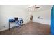 Office space with tile flooring, desk and chair, ceiling fan, and bright natural light at 6507 Shadowbrook Run, Lakeland, FL 33813
