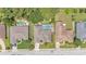Aerial view of homes with pools, well-maintained lawns, and mature trees at 6757 High Grove Dr, Lakeland, FL 33813