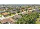 An aerial view of a residential neighborhood featuring well-maintained homes and landscaping at 6757 High Grove Dr, Lakeland, FL 33813