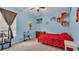Bright bedroom with a twin bed, and decor at 6757 High Grove Dr, Lakeland, FL 33813