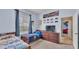 bedroom with two twin beds, a dresser, and themed wall decor at 6757 High Grove Dr, Lakeland, FL 33813