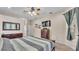 View of the bedroom showing multiple furnishings, tv, and closet at 6757 High Grove Dr, Lakeland, FL 33813