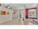 Inviting foyer with tile flooring, high ceilings, and access to multiple living spaces at 6757 High Grove Dr, Lakeland, FL 33813