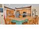 Well-equipped kitchen features custom cabinetry and breakfast bar seating at 6757 High Grove Dr, Lakeland, FL 33813