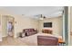 Open-concept living room with ample seating and access to other areas at 6757 High Grove Dr, Lakeland, FL 33813