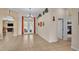Open living space with tile flooring, french doors, and abundant natural light at 6757 High Grove Dr, Lakeland, FL 33813