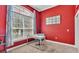 Well-lit home office featuring a large window and neutral carpet flooring at 6757 High Grove Dr, Lakeland, FL 33813