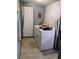 Convenient laundry room with essential appliances and ample storage space at 6915 Dove Meadow Trl, Lakeland, FL 33810